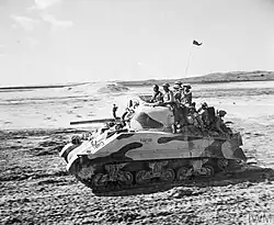Indian Armoured Corps in a Sherman III tank in the Middle East, March 1944.