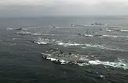 JS Ikazuchi sails with INS&nbsp;Jyoti, USS&nbsp;John S. McCain, INS&nbsp;Kuthar, JS&nbsp;Murasame, USS&nbsp;Mustin, JS&nbsp;Kirishima, and JS&nbsp;Takanami, 16 April 2007.