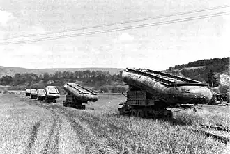 Pneumatic pontons being carried by heavy 6×6 transports