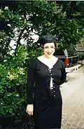 Image 76Woman dressed in black maxi skirt, top and hat, 1995. (from 1990s in fashion)