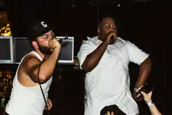 Ritchie with a T (left) and Stepa J. Groggs (right) performing in 2018 Not pictured: Parker Corey