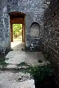 Inside, rear entrance and well