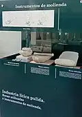 Collection of metates and grinding tools