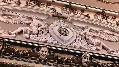 Decoration above the proscenium arch
