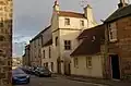 Thomsoun's House with previous white lime render.