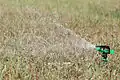 Small part-circle impact sprinkler for residential lawns