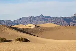 Sand dunes and rocky peaks