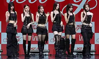 Izna in September 2025 L–R: Koko, Mai, Ryu Sa-rang, Bang Jee-min, Choi Jung-eun, Jeong Sae-bi