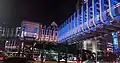 The access bridge after revitalization in 2019, illuminated in blue to commemorate World Autism Awareness Day that year