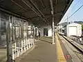 A view of the platform. Note the elevator and the siding on the right.
