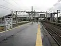 A view of the platforms and tracks showing how the station building spans the tracks.