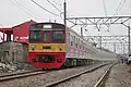 A KRL Jabodetabek 203 series 8-car set on the Bogor Line in July 2012