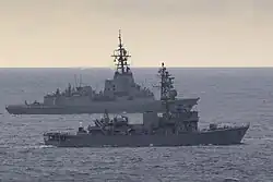 JS Chikuma and HMAS&nbsp;Brisbane sail in formation on 10 November 2023.