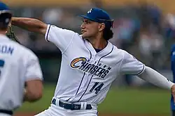 Jac Caglianone throwing before an Omaha Storm Chasers game