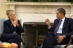 Photograph of Jan Brewer and Barack Obama sitting