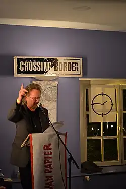 Jan J.B. Kuipers as a member of the Men of Paper during Crossing Border festival, The Hague, 2011.