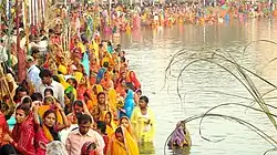 Devotees gathered at a pond to worship the sun god Surya and his sister Chhathi Maiya in Janakpurdham, Madhesh Province, Nepal