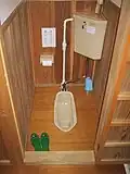 A Japanese temple hotel, with squat toilet and toilet slippers