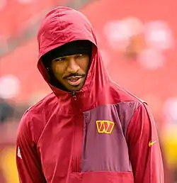 A photo of Daniels in a red hooded Washington Commanders jacket