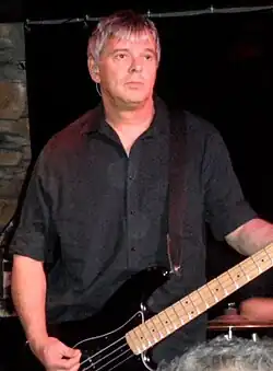 Burnel performing with The Stranglers in 2013