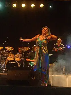 Jenny B performing at an outdoor concert held at the Teatro Nuovo in Giardini Naxos, Sicily, 27 July 2011