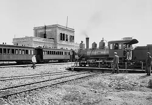Image 15The Jerusalem Railway Station c. 1900. The locomotive on the turntable is "Ramleh" (J&J No. 3), a Baldwin 2-6-0. The station was the terminus of the Jaffa–Jerusalem railway until its closure in 1998. Today, the station is abandoned and suffering from neglect and vandalism, although it is one of 110 buildings selected for preservation in Jerusalem.