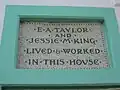 Inscription over side door.