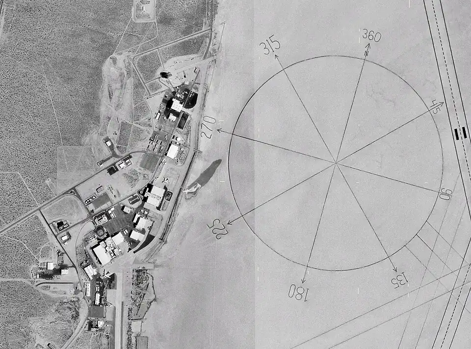Image 48The world's largest compass rose, drawn on the desert floor at Edwards Air Force Base in California, United States. Painted on the playa near Dryden Flight Research Center, it is inclined to magnetic north and is used by pilots for calibrating heading indicators. (Credit: NASA.) (from Portal:Earth sciences/Selected pictures)