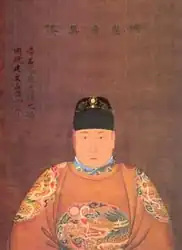 A posthumous portrait of the Jianwen Emperor wearing a red robe and a black cap