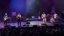 Joan performing in 2025