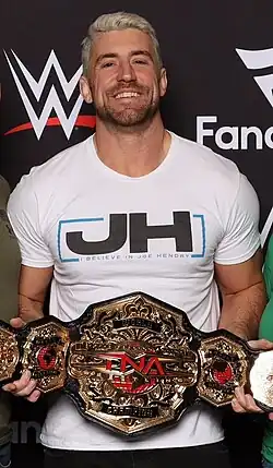 Joe Hendry with the sixth design of the belt, introduced in January 2024 when the company rebranded back to TNA Wrestling.