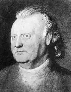 A black and white image of John Landen. In this image he is older, with his hair worn back on the style of the time.