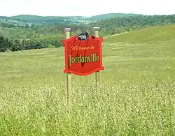 Settlement sign for Jordanville