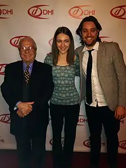 From left to right: Jorge Calandrelli, Sonya Belousova, and Ostinelli at a 2014 Grammy Party