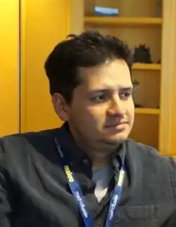 Portrait of a man in his mid-thirties.