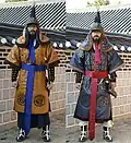 Modern reenactors wearing a complete Dujeong-gap set. While conventionally shown as red, the fabric could be of various colors.