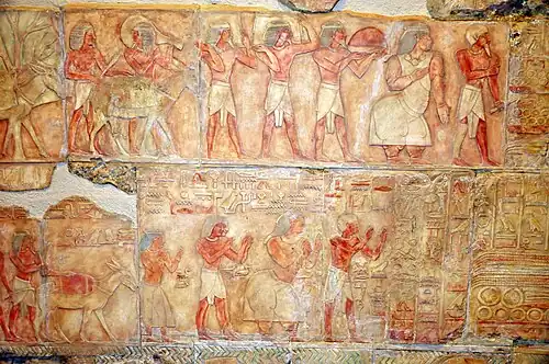 Puntites including their Queen, bearing tributes, represented in the classic reddish-brown colouring as Egyptians[237]