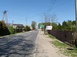 Street and road sign of Julianów