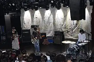 Julie performing live in Boston, 2024