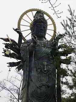 Statue of the eighteen-armed Juntei Kannon at Shichihō-ji in Nose, Osaka, Japan.