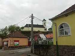 View of the village, with the church above the buildings