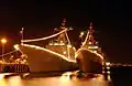 ROKS Munmu and ROKS Gwanggaeto the Great lighted ship's lights to celebrate the July 4th Independence Day 2006.