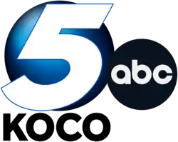 A white bold italicized sans serif 5 on a blue sphere, beneath which are the letters K O C O. To the right and slightly below the 5 is the ABC network logo.