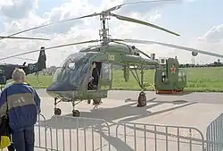 A Kamov Ka-226 without a cargo module and its cargo module (background) at the MAKS 2001 International Aviation and Space Salon