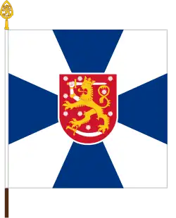 The colour of the Finnish Guard Jaeger Regiment. The cross form of the flag, typical for Imperial Russian colours and also used in the Jääkärilippu, is symbolic of the lineage of the regiment as part of the Russian imperial guard.[13]: 150 