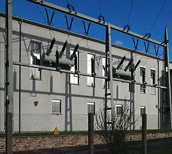 110&nbsp;kV bushings in a building wall