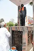 Nitish Kumar paying homage to Singh's statue in 2022