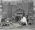 A woodcarver in Kashmir photographed by Fred Bremner in about 1896.