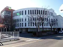 Kasukabekyoei High School was used as the model school for Lucky Star, but it is not particularly visually distinct, making it a "sacred place" only for fans of the series.