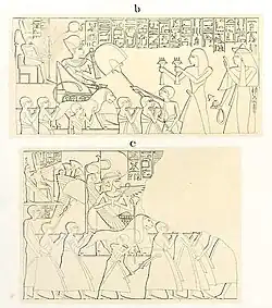 Man offering to statues carried by priests